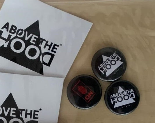 Pins and Stickers Above The Hood